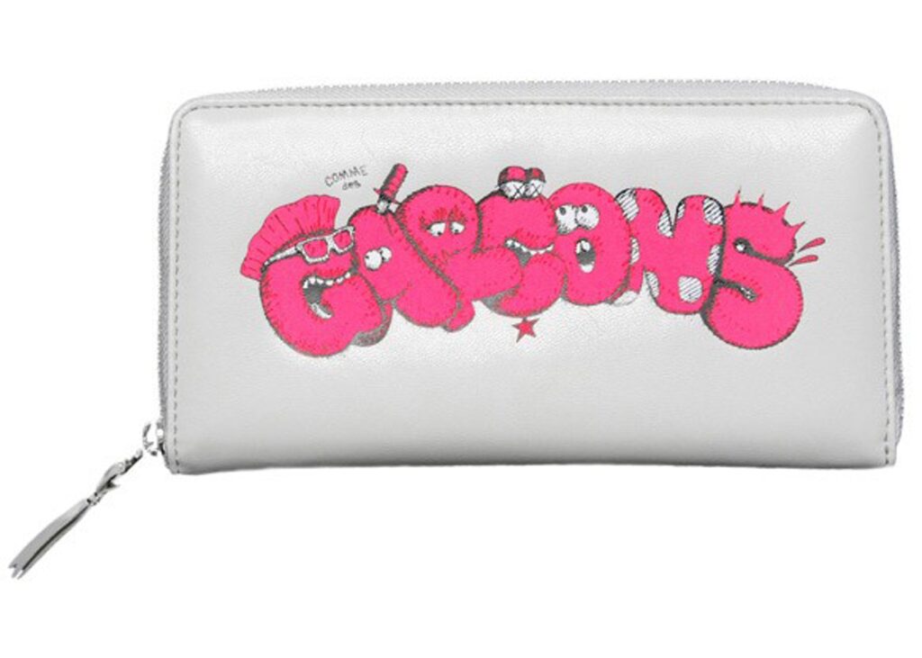 KAWS Comme des Garcons wallet pink