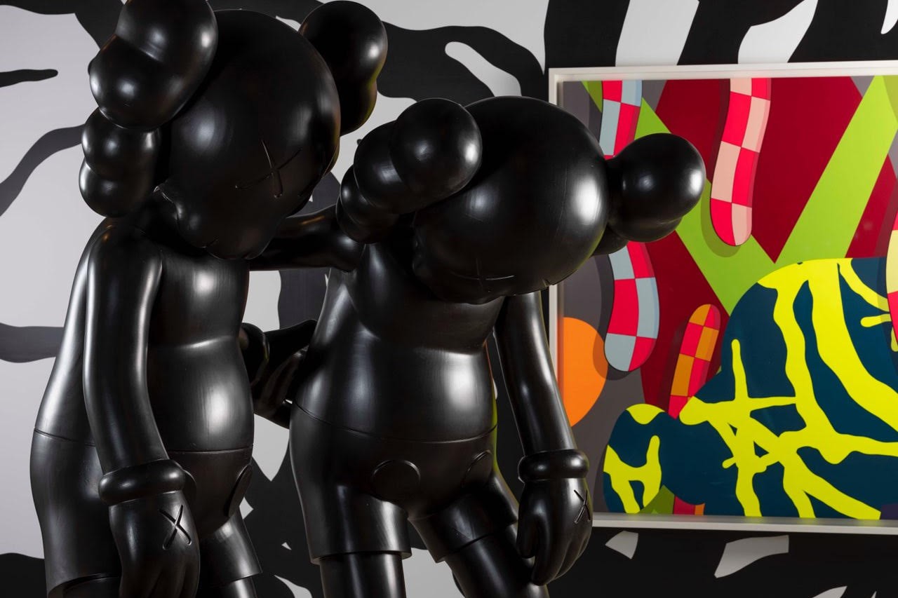 Premium AI Image  Kaws Unleashed The Iconic Artist Bedecked in Tattoos  Musing on a Louis Vuitton Throne